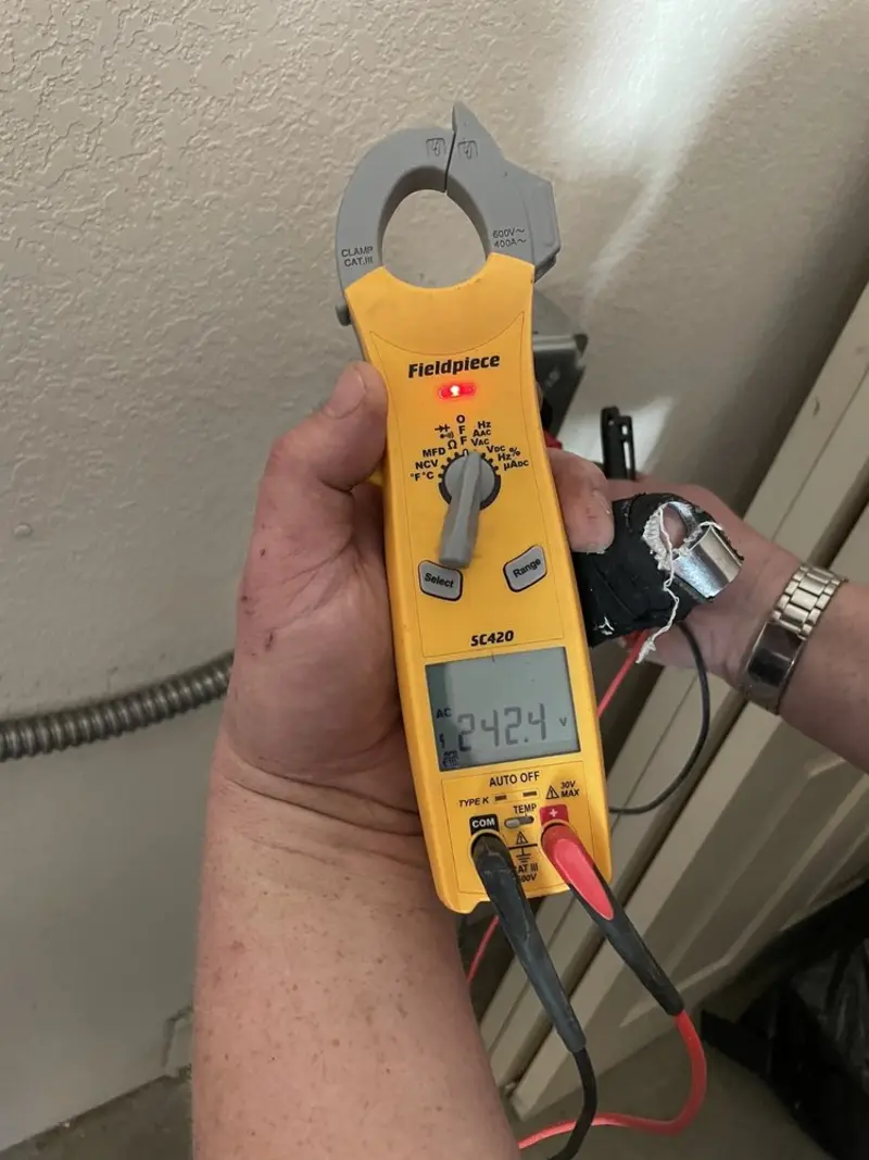 Voltage testing with clamp meter during Hot Tub / Pool Electrical Wiring in Oneida